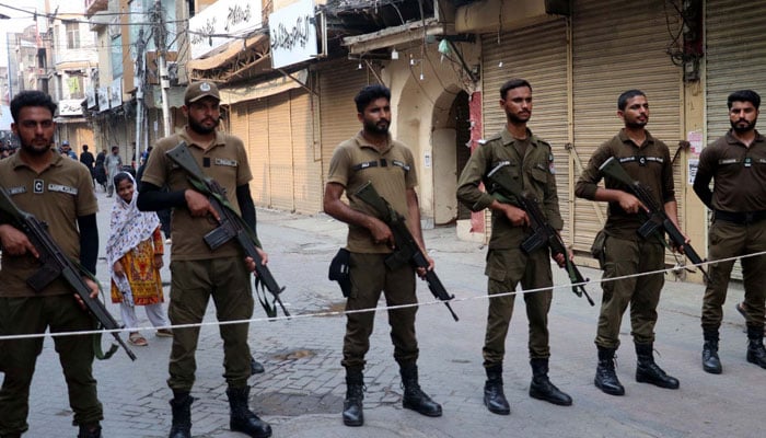 Security officials stand high alert on route of procession in account of 8th Muharram-ul-Haram in Lahore on July 4, 2025. — PPI