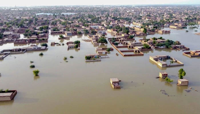 This aerial view shows a flooded residential area after heavy monsoon rains in Balochistan province on August 29, 2022.  — AFP