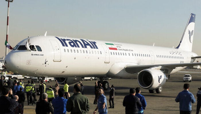 An Airbus A321 airliner arrives at the Mehrabad International Airport during the delivery of the first batch of planes to the Iranian state airline Iran Air in the capital Tehran on January 12, 2017. — AFP