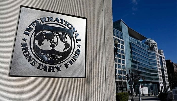 This photo taken on January 26, 2022, shows the seal for the International Monetary Fund (IMF) in Washington, DC. — AFP