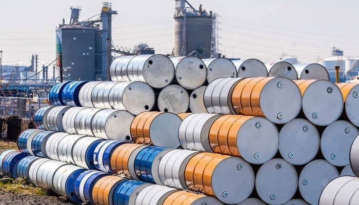 Crude oil barrels staked at a refinery can be seen. — APP/File